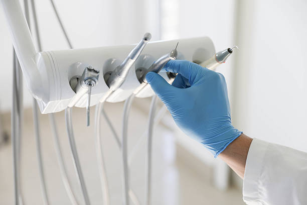 Professional Tooth Extraction technician working in Surry County County, NC
